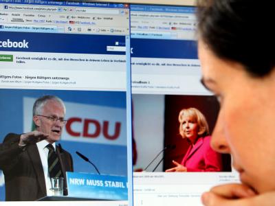 Internetwahlkampf / Videobotschaften der NRW-Spitzenkandidaten J&uuml;rgen R&uuml;ttgers (CDU) und Hannelore Kraft (SPD) bei Facebook. (Bild: dpa)