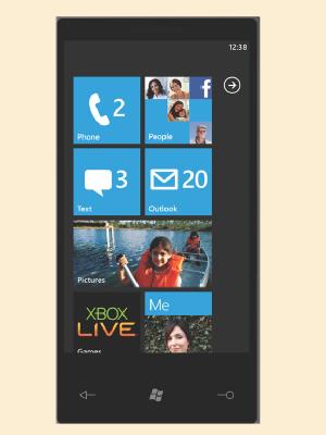 Windows Phone 7 / So startet Windows Phone 7. Der Homescreen ist in &laquo;Tiles&raquo; unterteilt. Diese zeigen die neuesten Informationen aus Facebook & Co. an. (Bild: Microsoft)